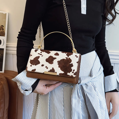 Ladies' cow print hand-held crossbody bag, retro crossbody bag with detachable chain, fashionable women's bag