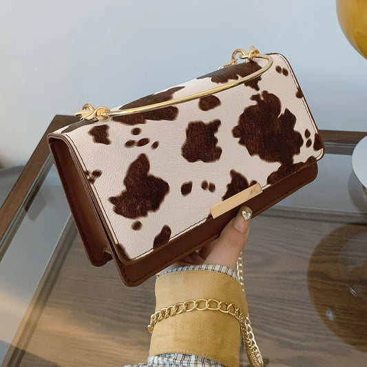 Ladies' cow print hand-held crossbody bag, retro crossbody bag with detachable chain, fashionable women's bag